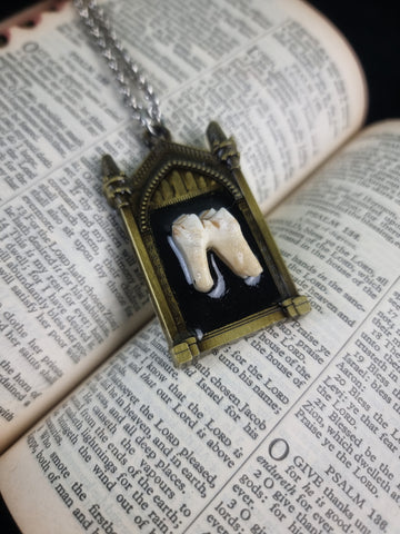 Pulling teeth necklace